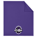 A purple blanket with a folded top-right corner, featuring a 'Celebration Storm' shield logo printed near the bottom center. The logo contains a purple storm cloud graphic with white and black text.