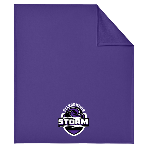 A purple blanket with a folded top-right corner, featuring a 'Celebration Storm' shield logo printed near the bottom center. The logo contains a purple storm cloud graphic with white and black text.